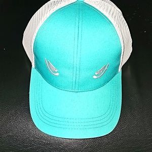 Hat by Mad Pelican fishing gear.